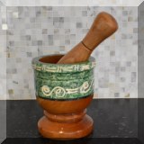 K86. Wooden mortar and pestle 4”h - $10 